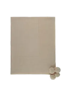 Knitted blanket with pompons