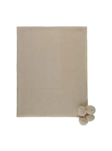 Knitted blanket with pompons